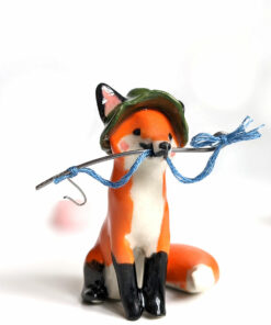 Fox figurine with fishing gear