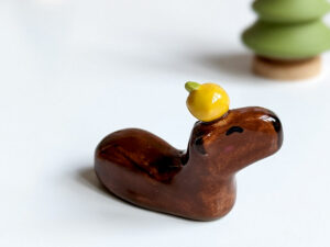 ceramic figurine capybara orange holder