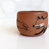 handmade fox hare red clay cup