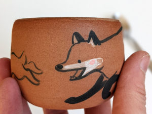 handmade fox hare red clay cup