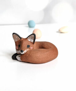 red fox in red clay figurine