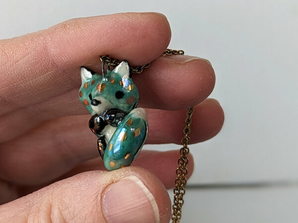 cute blue fox porcelain pendant with gold