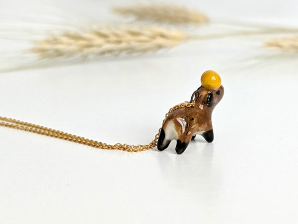 handmade porcelain pendant capybara orange