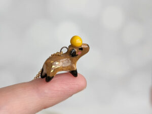 handmade porcelain pendant capybara orange