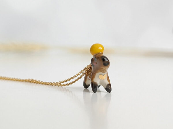 handmade porcelain pendant capybara orange