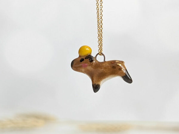 handmade porcelain pendant capybara orange