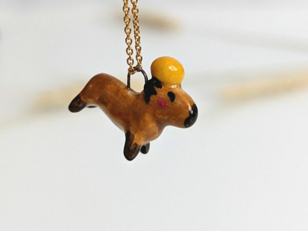 handmade porcelain pendant capybara orange