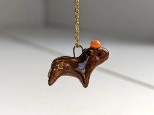 handmade porcelain pendant capybara orange