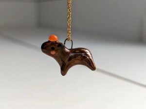 handmade porcelain pendant capybara orange
