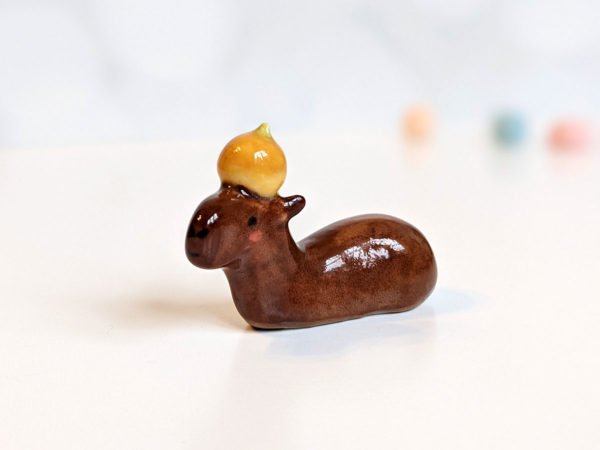 ceramic figurine capybara orange holder