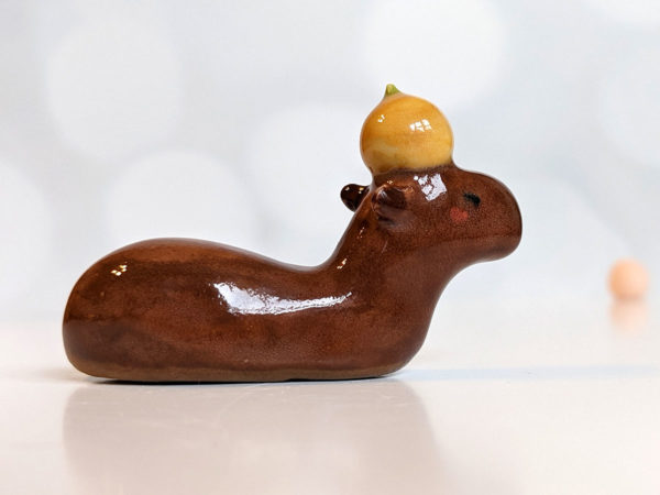 ceramic figurine capybara orange holder