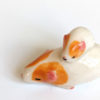 guinea pig and kid figurine porcelain