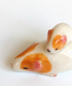 guinea pig and kid figurine porcelain