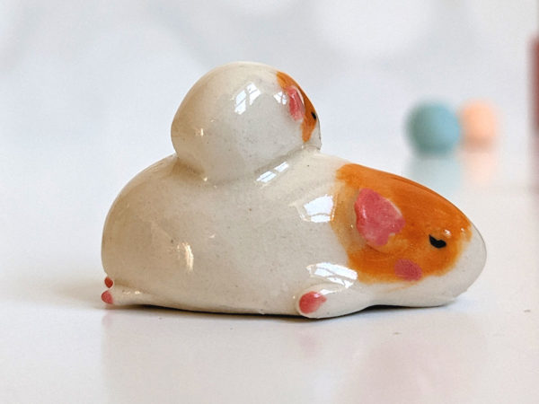 guinea pig and kid figurine porcelain