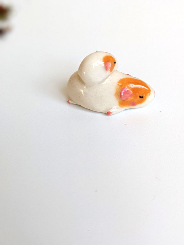 guinea pig and kid figurine porcelain