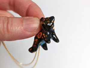 black panther porcelain pendant handmade with gold and pearl