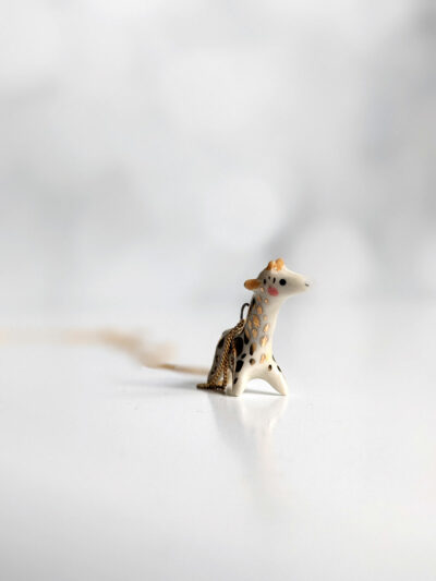 porcelain giraffe pendant