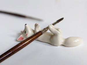 handmade porcelain figurine arctic fox chopstick holder