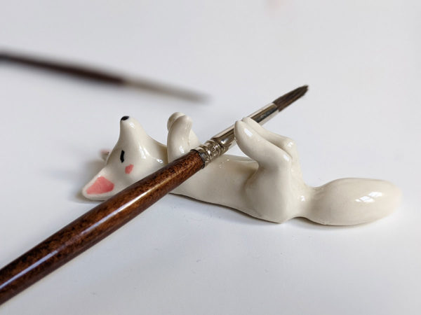 handmade porcelain figurine arctic fox chopstick holder