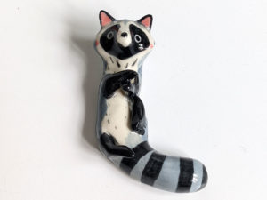 porcelain raccoon chopstick holder