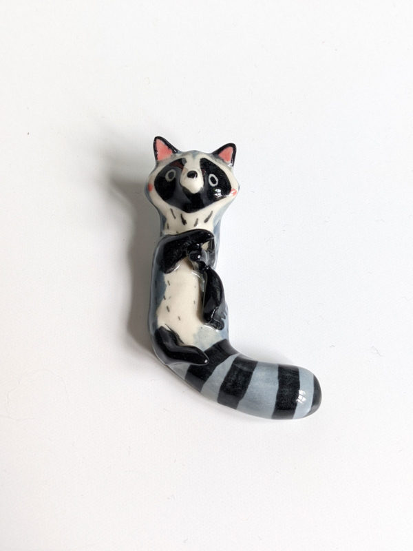 porcelain raccoon chopstick holder