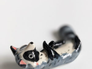 porcelain raccoon chopstick holder