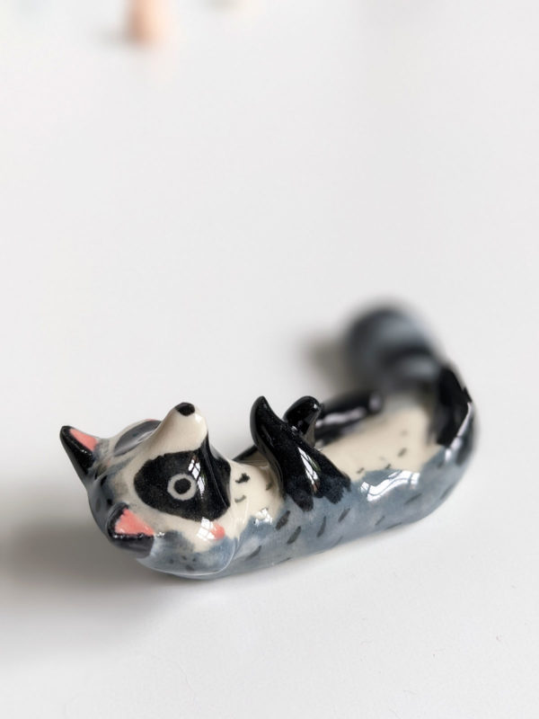 porcelain raccoon chopstick holder