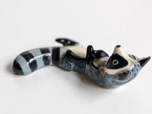 porcelain raccoon chopstick holder