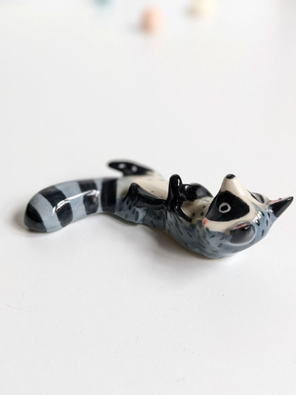 porcelain raccoon chopstick holder