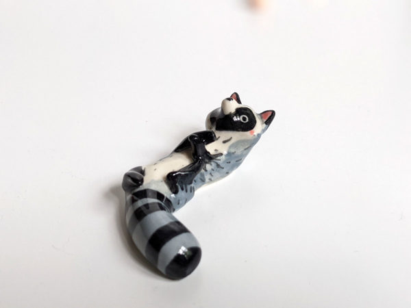 porcelain raccoon chopstick holder