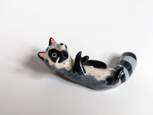 porcelain raccoon chopstick holder