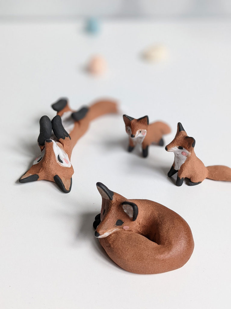 ceramic animals by kness - a family of foxes