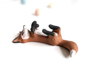 red fox brush holder red clay figurine