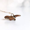 handmade porcelain anteater pendant