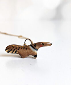 handmade porcelain anteater pendant