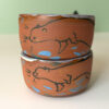 cute otter tumbler handmade in red clay kness