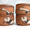 cute otter tumbler handmade in red clay kness