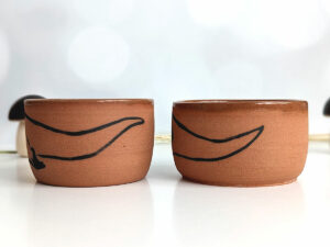 cute otter tumbler handmade in red clay kness