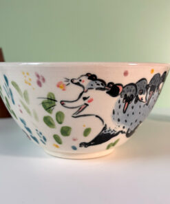 cute handmade porcelain bowl with an opossum family