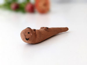 ceramic otter brush rest