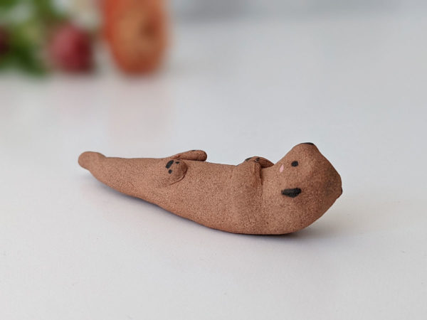 ceramic otter brush rest