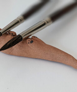 ceramic otter brush rest