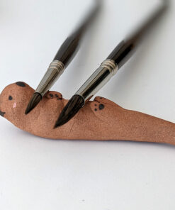 ceramic otter brush rest
