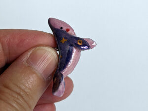 purple whale stars commission pendant