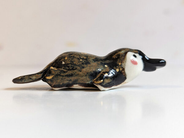 porcelain platypus figurine chopstick rest brush holder