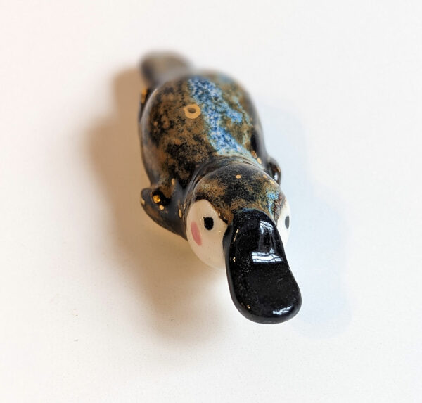 porcelain platypus figurine chopstick rest brush holder