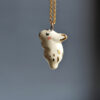 handmade porcelain pendant sleepy bunny with gold by kness