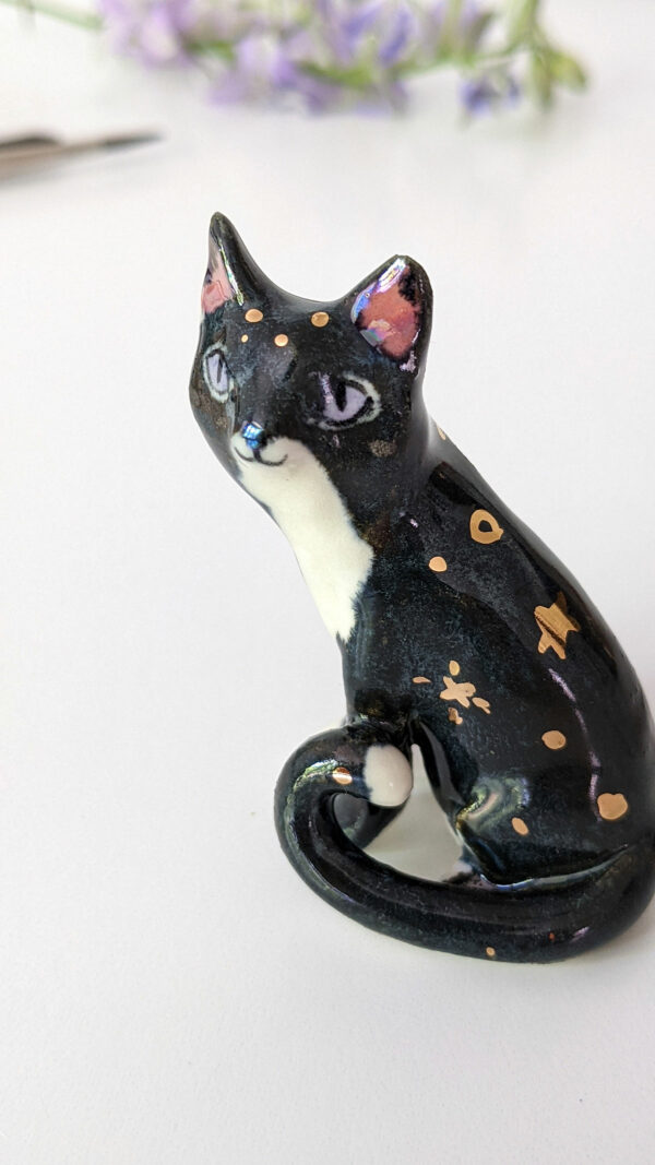 cat figurine porcelain gold