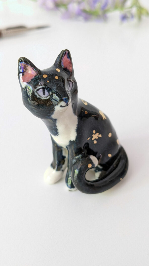 cat figurine porcelain gold