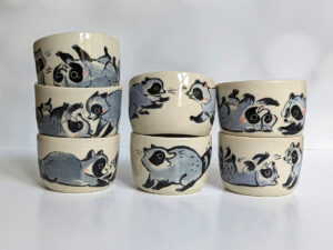 impossibly cute raccoon tumblers